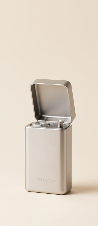 Steel Nurava floss case on a warm off-white background